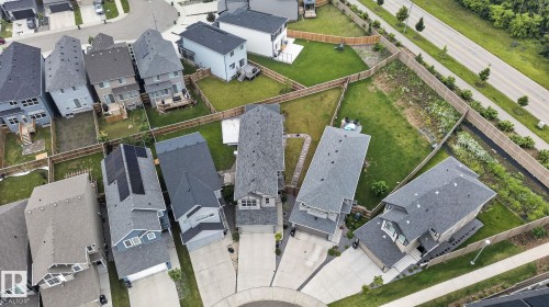Aerial view of a residential neighborhood with varied architectural styles - 23027 96 Avenue Nw, Edmonton, AB -  With View