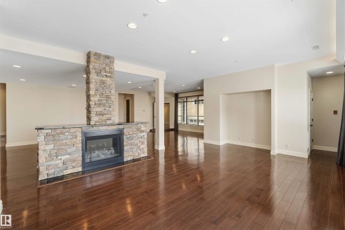 #401 10009 102 Av Nw, Edmonton, AB - Indoor With Fireplace