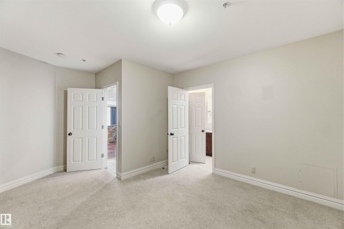 #401 10009 102 Av Nw, Edmonton, AB - Indoor Photo Showing Other Room
