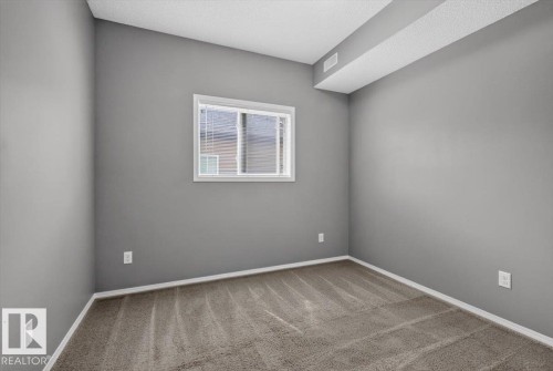 #25 6520 2 Av Sw, Edmonton, AB - Indoor Photo Showing Other Room