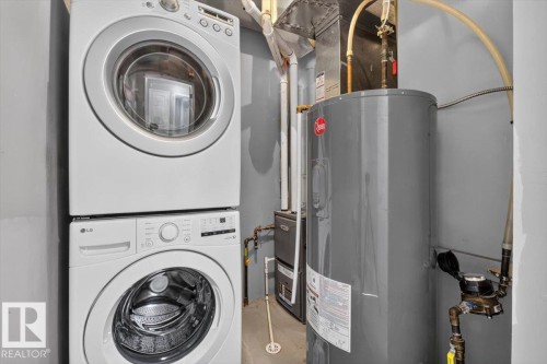 #25 6520 2 Av Sw, Edmonton, AB - Indoor Photo Showing Laundry Room