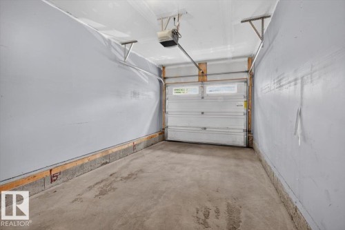 #25 6520 2 Av Sw, Edmonton, AB - Indoor Photo Showing Garage