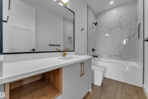 Modern vanity with a white countertop and integrated sink - 2039 156 Avenue Nw, Edmonton, AB - Indoor Photo Showing Bathroom
