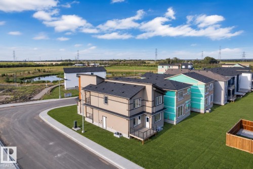 Contemporary residential architecture with multiple levels and balconies - 2039 156 Avenue Nw, Edmonton, AB - Outdoor With View