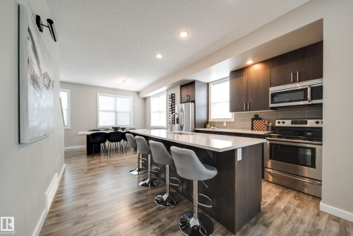 #1 2803 James Mowatt Tr Sw, Edmonton, AB - Indoor Photo Showing Kitchen With Upgraded Kitchen