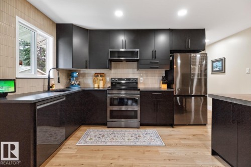 6807 101A Avenue Nw, Edmonton, AB - Indoor Photo Showing Kitchen With Stainless Steel Kitchen