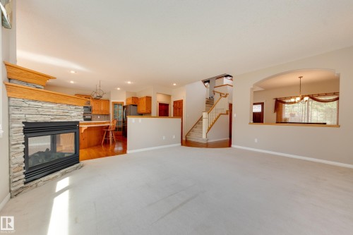 11503 15 Avenue Nw, Edmonton, AB - Indoor Photo Showing Living Room With Fireplace