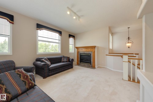 11503 15 Avenue Nw, Edmonton, AB - Indoor Photo Showing Living Room With Fireplace