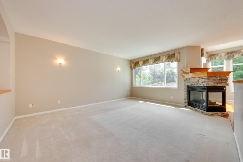 11503 15 Avenue Nw, Edmonton, AB - Indoor Photo Showing Living Room With Fireplace