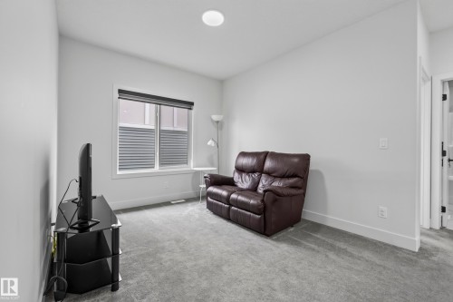 Recessed ceiling lighting, light gray wall paint, window with blinds, light gray carpet flooring, white trim - 7314 Morgan Road Nw, Edmonton, AB - Indoor