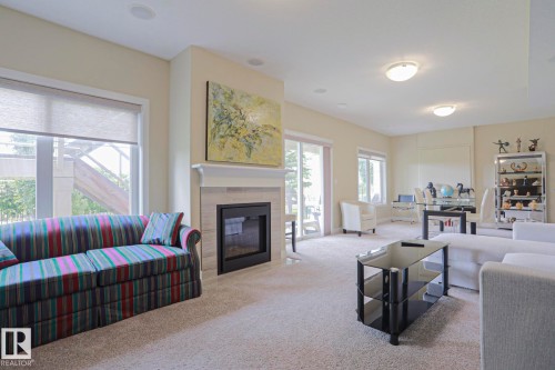#16 8132 217 St Nw, Edmonton, AB - Indoor Photo Showing Living Room With Fireplace