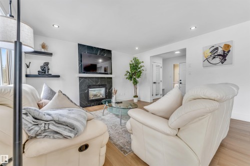 1218 87A Street Sw, Edmonton, AB - Indoor Photo Showing Living Room With Fireplace