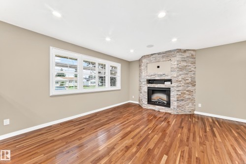 6307 92A Avenue Nw, Edmonton, AB - Indoor Photo Showing Living Room With Fireplace