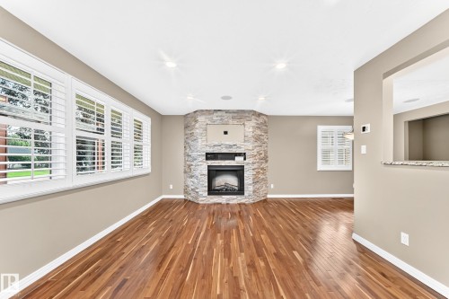 6307 92A Avenue Nw, Edmonton, AB - Indoor Photo Showing Other Room With Fireplace