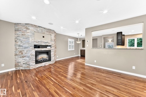 6307 92A Avenue Nw, Edmonton, AB - Indoor Photo Showing Living Room With Fireplace