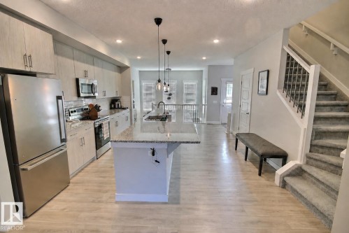 17455 77 Street Nw, Edmonton, AB - Indoor Photo Showing Kitchen With Upgraded Kitchen