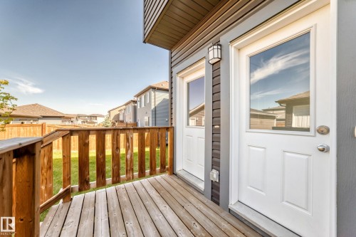 Wood-plank deck with wood railing - 3816 Chrustawka Place Sw, Edmonton, AB - Outdoor With Deck Patio Veranda With Exterior
