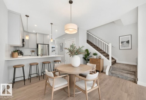 photo has been virtually staged - 3816 Chrustawka Place Sw, Edmonton, AB - Indoor Photo Showing Dining Room