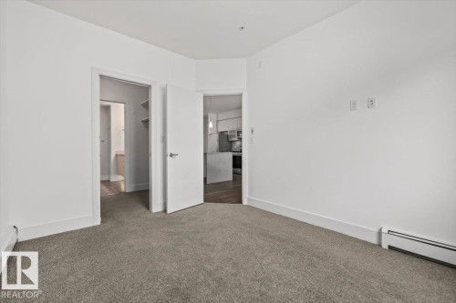 #104 10030 83 Av Nw, Edmonton, AB - Indoor Photo Showing Other Room