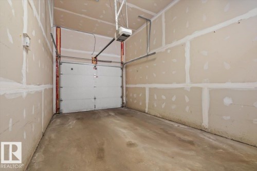 #104 10030 83 Av Nw, Edmonton, AB - Indoor Photo Showing Garage