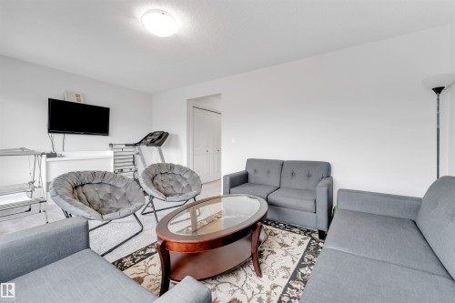 933 Mcconachie Boulevard Nw, Edmonton, AB - Indoor Photo Showing Living Room