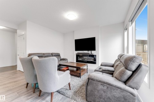 933 Mcconachie Boulevard Nw, Edmonton, AB - Indoor Photo Showing Living Room With Fireplace