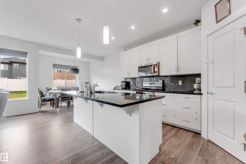 933 Mcconachie Boulevard Nw, Edmonton, AB - Indoor Photo Showing Kitchen With Double Sink With Upgraded Kitchen