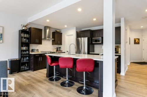 2335 Sparrow Crescent Nw, Edmonton, AB - Indoor Photo Showing Kitchen With Upgraded Kitchen