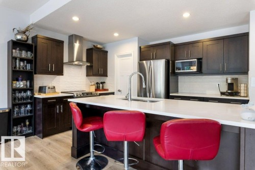 2335 Sparrow Crescent Nw, Edmonton, AB - Indoor Photo Showing Kitchen With Double Sink With Upgraded Kitchen