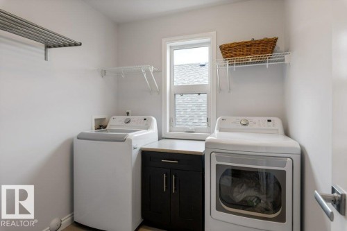 2335 Sparrow Crescent Nw, Edmonton, AB - Indoor Photo Showing Laundry Room