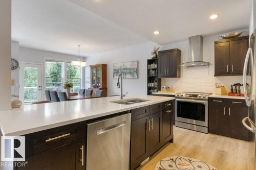 2335 Sparrow Crescent Nw, Edmonton, AB - Indoor Photo Showing Kitchen With Double Sink