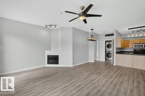 #207 10707 102 Av Nw, Edmonton, AB - Indoor Photo Showing Other Room