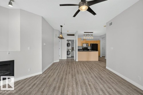 #207 10707 102 Av Nw, Edmonton, AB - Indoor With Fireplace