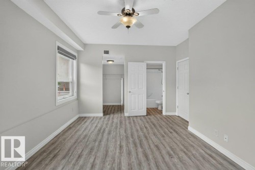 #207 10707 102 Av Nw, Edmonton, AB - Indoor Photo Showing Other Room
