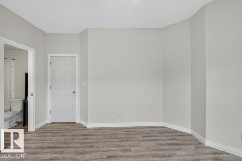 #207 10707 102 Av Nw, Edmonton, AB - Indoor Photo Showing Other Room