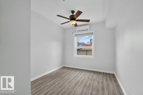 #207 10707 102 Av Nw, Edmonton, AB - Indoor Photo Showing Other Room