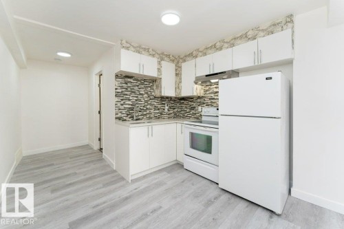 10712 103 Street Nw, Edmonton, AB - Indoor Photo Showing Kitchen