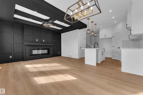 10709 98 Street, Morinville, AB - Indoor Photo Showing Kitchen With Fireplace