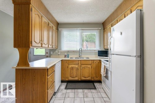 57 Patterson Crescent, St. Albert, AB - Indoor Photo Showing Kitchen With Double Sink