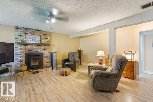 57 Patterson Crescent, St. Albert, AB - Indoor Photo Showing Living Room With Fireplace