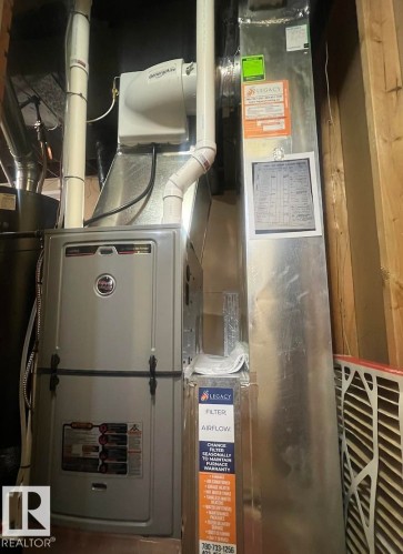 Furnace system with integrated humidifier and ductwork - 9828 84 Avenue Nw, Edmonton, AB - Indoor Photo Showing Basement