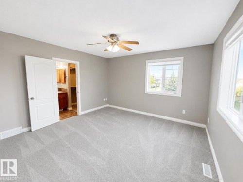 27 Deer Coulee Drive, Didsbury, AB - Indoor Photo Showing Other Room