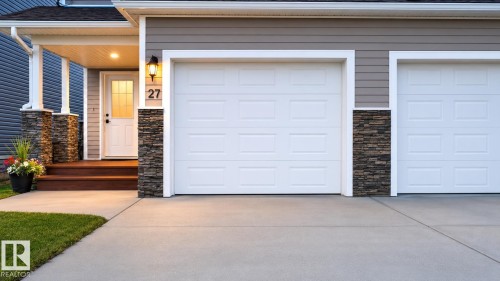 27 Deer Coulee Drive, Didsbury, AB - Outdoor With Exterior