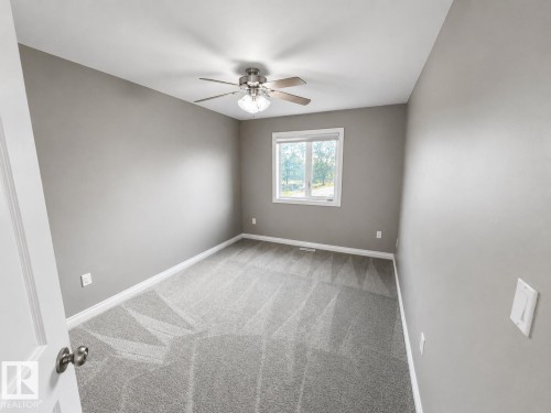 27 Deer Coulee Drive, Didsbury, AB - Indoor Photo Showing Other Room