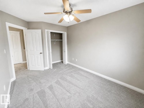 27 Deer Coulee Drive, Didsbury, AB - Indoor Photo Showing Other Room
