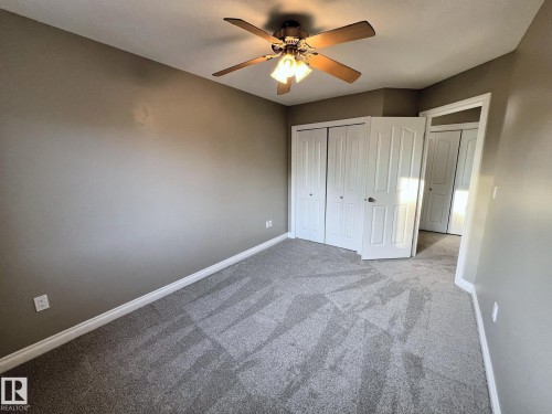27 Deer Coulee Drive, Didsbury, AB - Indoor Photo Showing Other Room
