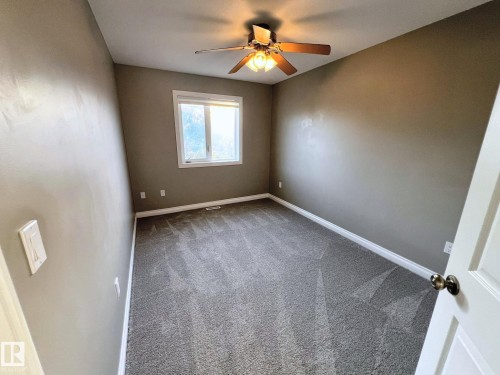27 Deer Coulee Drive, Didsbury, AB - Indoor Photo Showing Other Room
