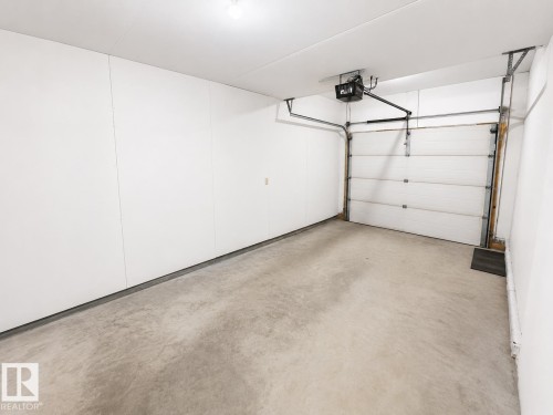 27 Deer Coulee Drive, Didsbury, AB - Indoor Photo Showing Garage