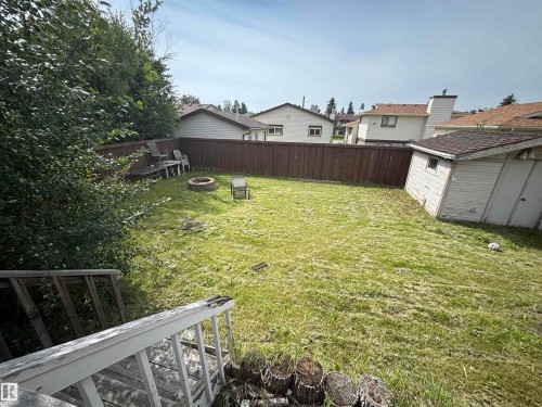 Expansive backyard featuring a fenced perimeter and a storage shed - 9223 172 Avenue Nw, Edmonton, AB 