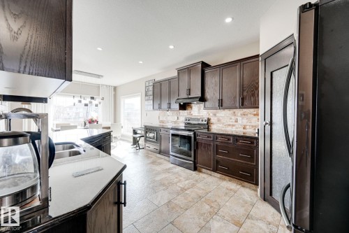 876 Hodgins Road Nw, Edmonton, AB - Indoor Photo Showing Kitchen With Double Sink